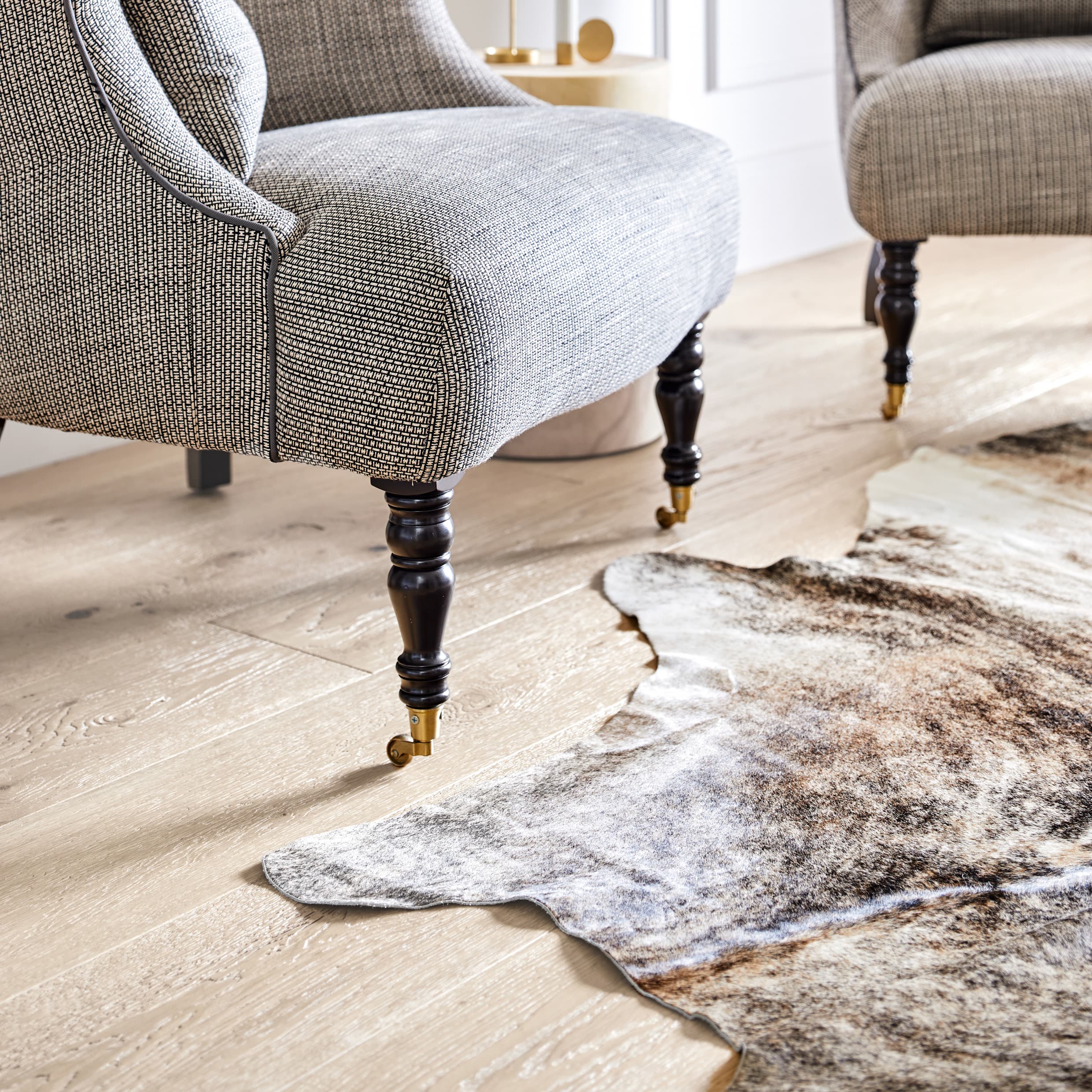 Liming White floor under beige armchair