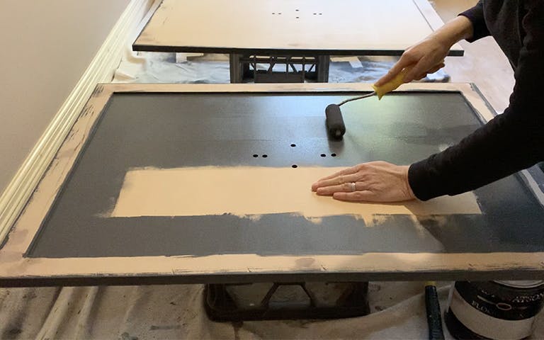 Painting using a roller the laundry doors